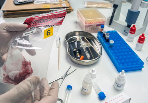 Preview: Criminalistics police write victim's details in bloodstained gauze murder, conceptual image