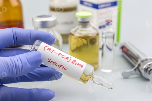 Preview: Scientist with blue latex gloves holds vials of ZIKA virus in laboratory for analysis