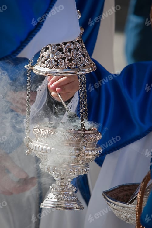 Preview: Young people in procession with incense burners in Holy week, Spain