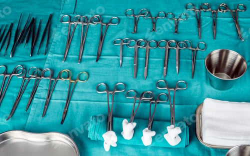 Preview: Scissors surgical with torundas in an operating theater, composition horizontal, conceptual image