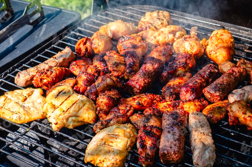 Preview: Grilled Meat Over the Coals on Barbecue