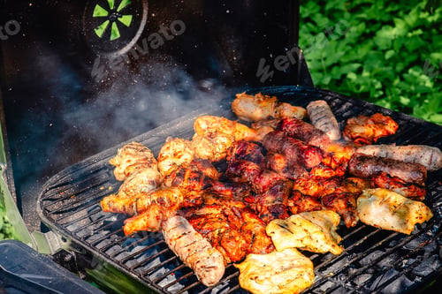 Preview: Grilled Meat Over the Coals on Barbecue