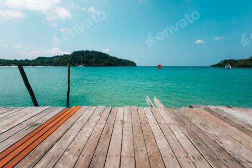 Preview: Wooden pier overlooking the turquoise sea at a tropical island in the Eastern Sea of Thailand.