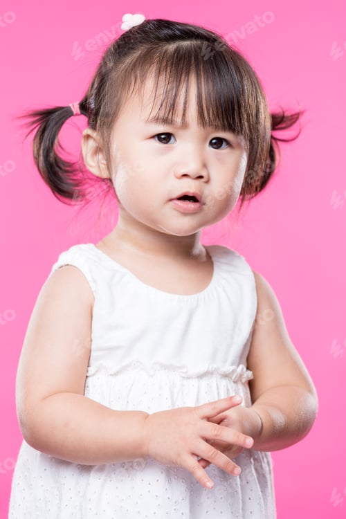 Preview: Little Asian Girl Over Pink Background