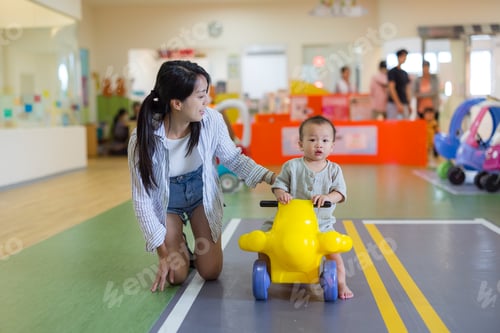 Preview: Baby riding car with mother at playhouse