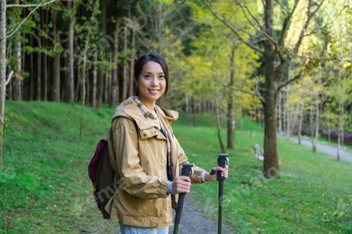 Preview: Outdoor woman hiking with supportive walking pole