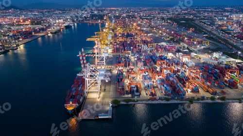 Preview: Busy Commercial Port Terminal With Large Cargo Ships, Stacked Shipping Containers, and Heavy Cranes