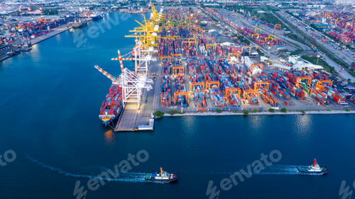 Preview: Busy Commercial Port Terminal With Large Cargo Ships, Stacked Shipping Containers, and Heavy Cranes