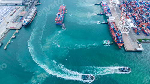 Preview: Busy cargo container shipyard commercial multiple cargo container ships docking and tugboats maneuve