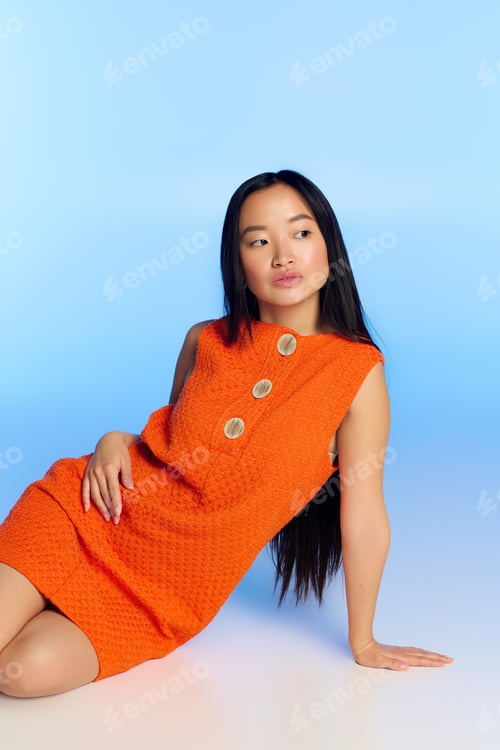 Preview: Elegance and style shine through a young woman in vibrant summer attire