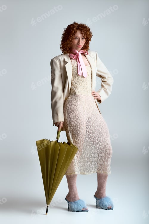 Preview: Stylish young woman with a unique umbrella showcases modern fashion creativity