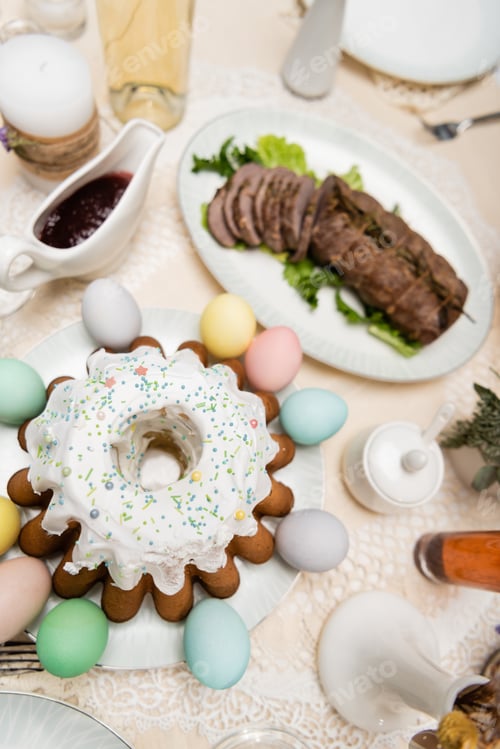 Preview: Top View of Delicious Easter Cake Near Painted Eggs on Table Served With Easter Dinner