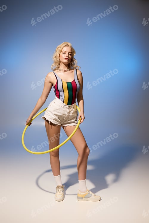 Preview: Summer fun with a beautiful woman in vibrant attire and a hula hoop