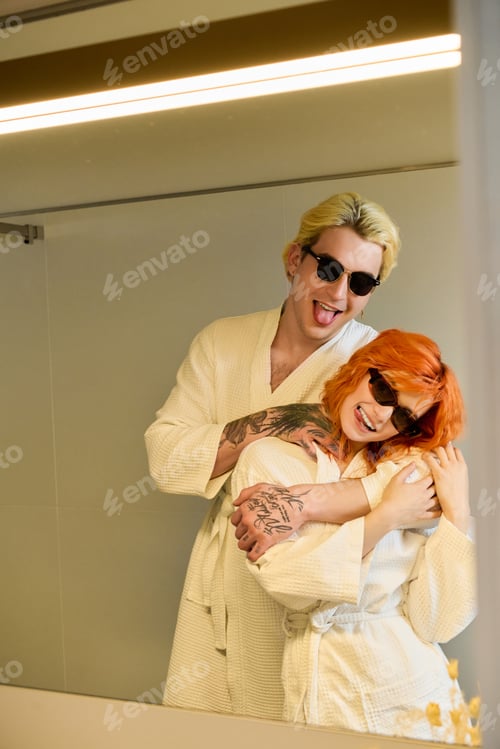 Preview: Joyful moments of a beautiful couple enjoying summer vacation in a modern hotel