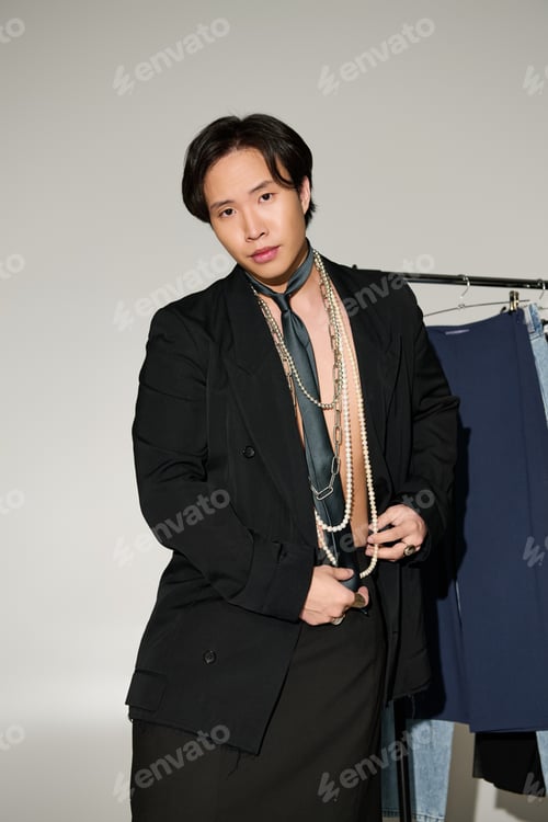 Preview: Capturing creative energy in a stylish backstage moment under soft lighting