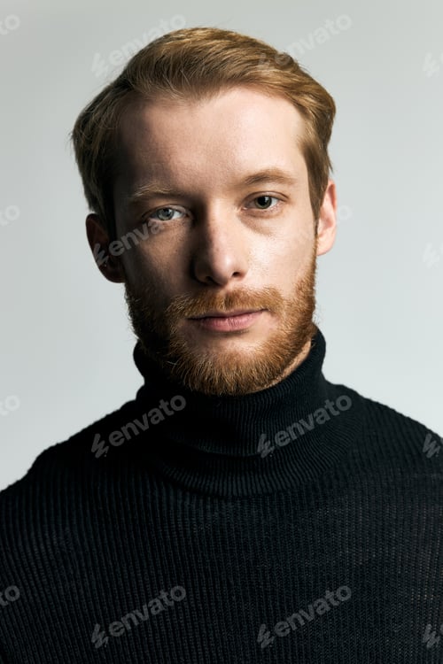 Preview: Stylish young man showcasing confidence in modern fashion with a striking look