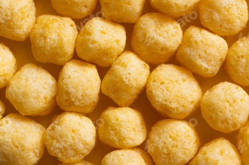 Preview: Top View of Puffed, Delicious and Salty Cheese Pops