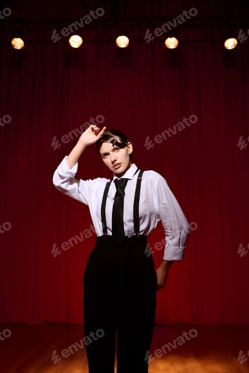 Preview: Captivating performance of a young artistic woman on stage in the theatre