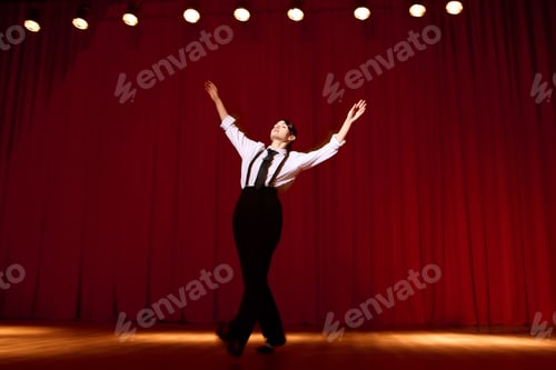 Preview: Artistic expression radiates from a young woman on stage in a vibrant theatre setting