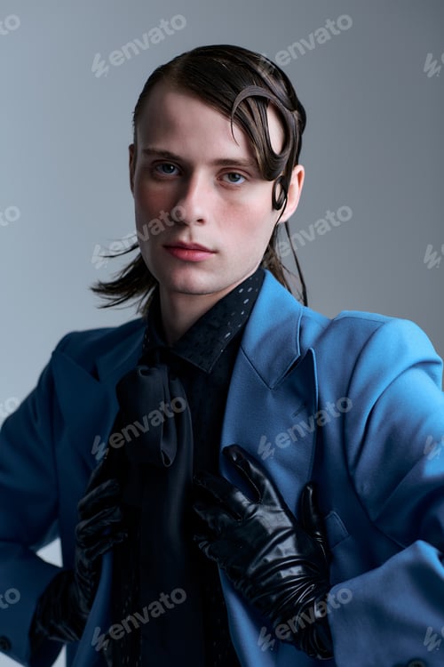 Preview: Young man in a studio shows off modern fashion with style and confidence