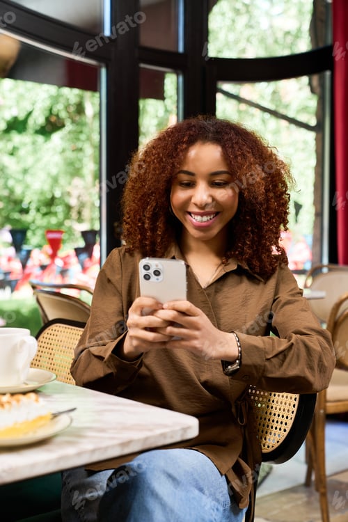 Preview: Joyful moments in a modern cafe with a young woman enjoying her day