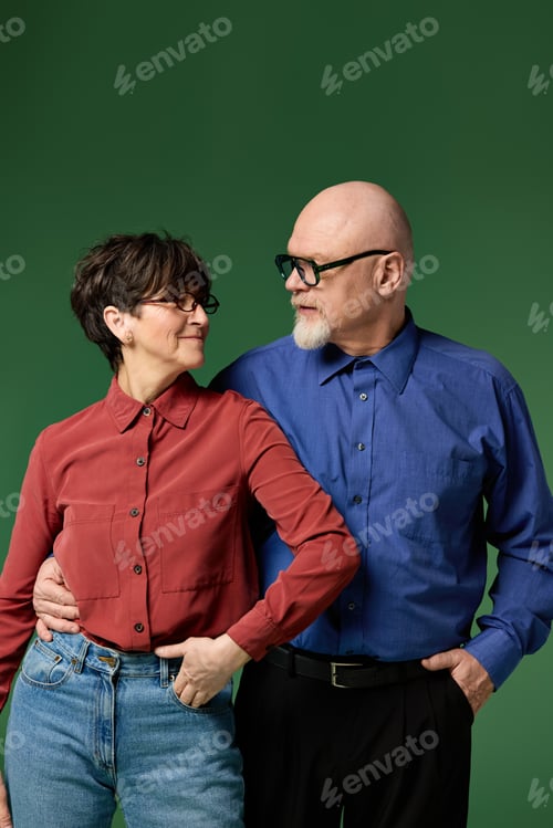 Preview: Joyful moments shared between a loving senior couple in a warm embrace