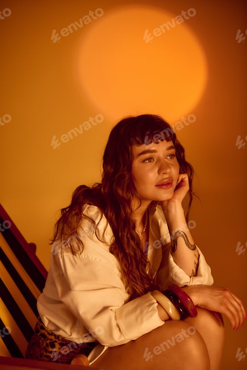 Preview: Vibrant summer bliss with a young woman enjoying the golden sunset glow