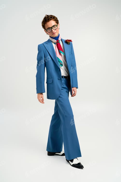 Preview: Stylish young man showcases trendy outfit in modern studio setting with artistic flair