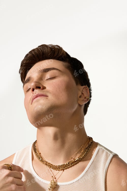 Preview: Stylish young man enjoying summer vibes with a trendy look and confident pose