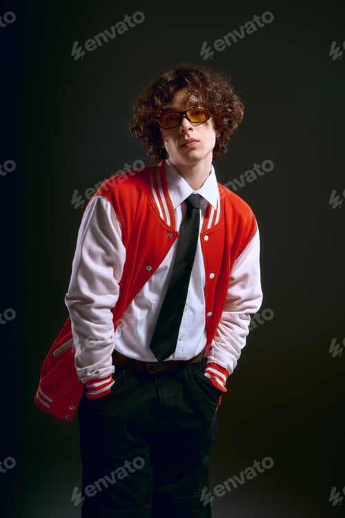Preview: Emotional young man in stylish attire exudes confidence and artistic flair