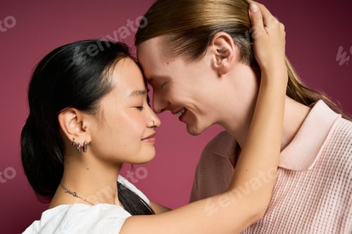 Preview: Young couple showing affection and connection in a warm moment of intimacy