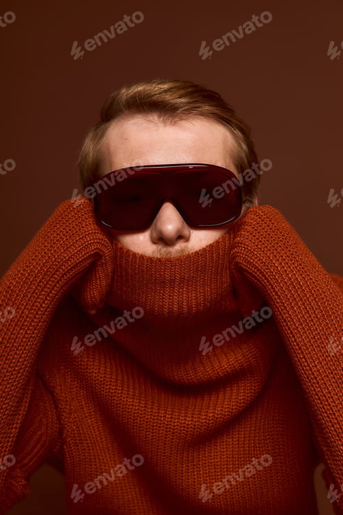 Preview: Stylish red haired man showcases modern fashion with confidence and flair
