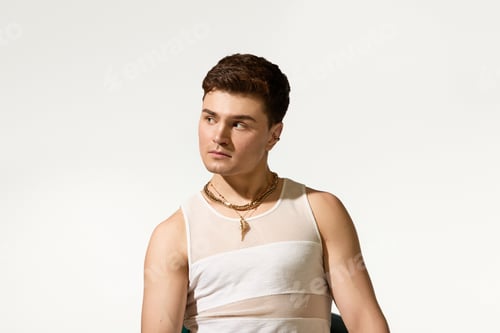 Preview: Stylish young man enjoys summertime vibes with effortless fashion and charm