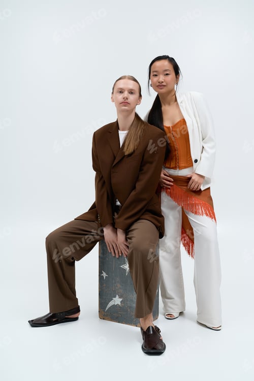 Preview: Young couple sharing a moment of connection and joy in stylish urban fashion