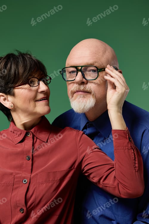 Preview: Loving senior couple sharing a joyful moment with smiles and tenderness