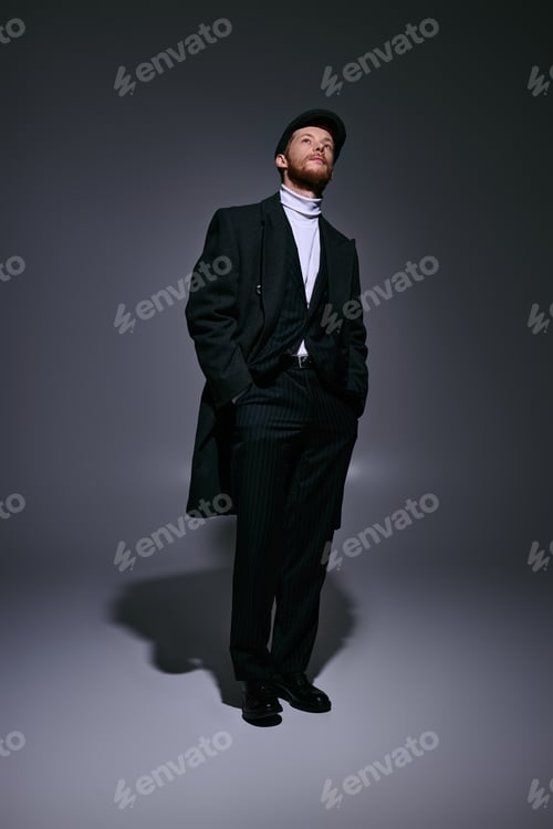 Preview: Stylish man with striking red hair showcases modern elegance in dramatic lighting