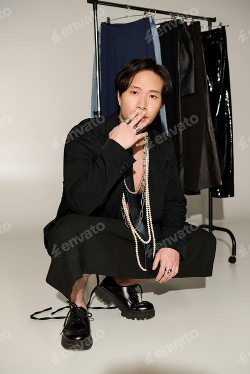 Preview: Stylish individual in a backstage setting captures the essence of artistic creation