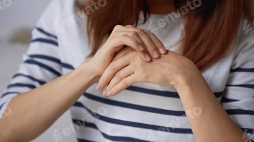 Preview: Partial View of Woman Suffering From Pain in Hand on Grey Background