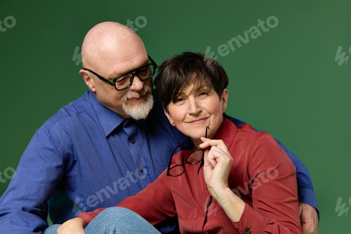 Preview: Joyful moments shared between a loving senior couple in a warm embrace
