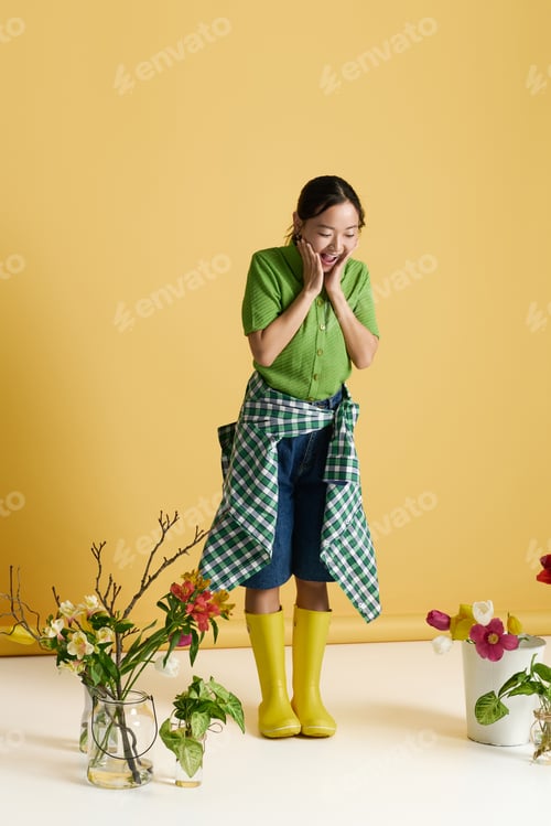 Preview: Excitement fills the air as a young woman enjoys a vibrant moment among colorful blooms