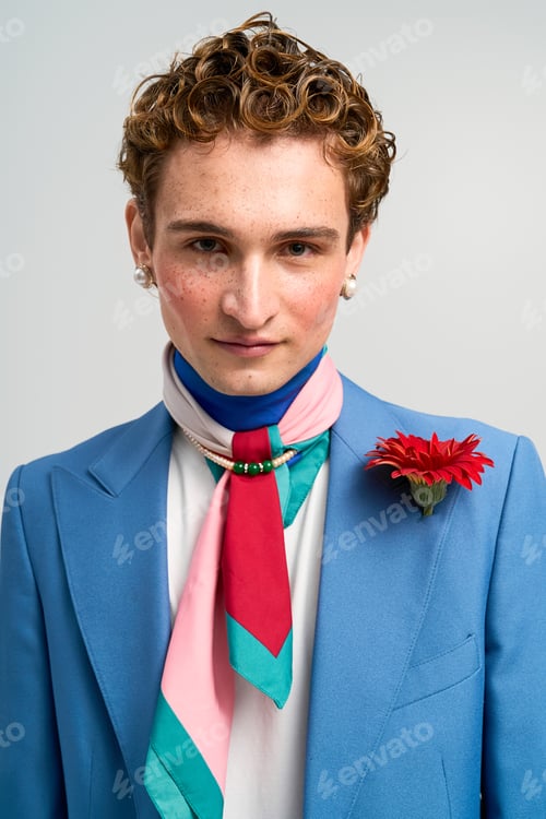 Preview: Stylish young man expressing fashion creativity in trendy studio setting