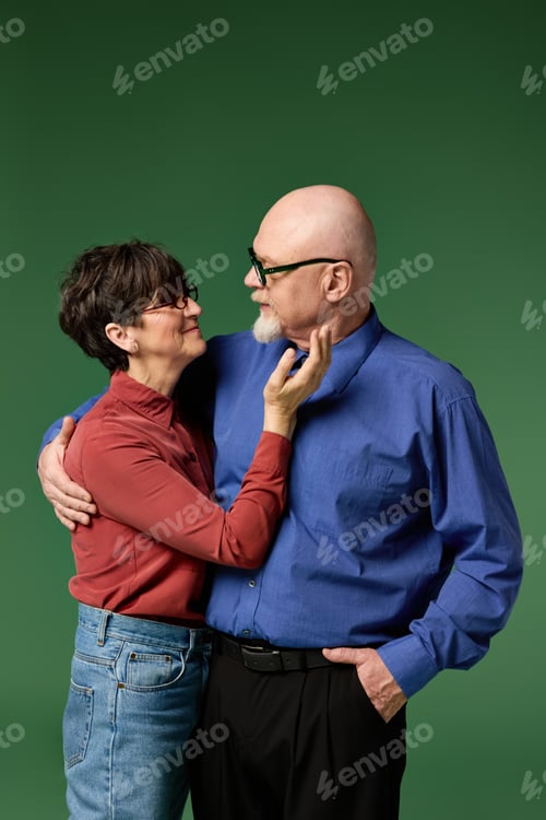 Preview: Loving senior couple sharing a tender moment together in a joyful embrace