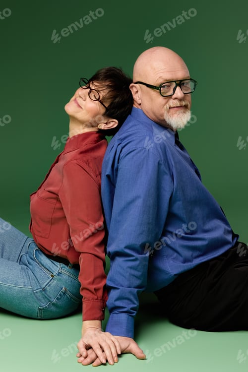 Preview: Celebrating love and companionship between a joyful senior couple sitting together