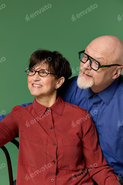 Preview: Cherishing moments of love and laughter between a senior couple in a colorful setting