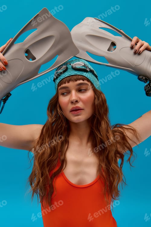 Preview: Energizing summer vibes from a stylish young woman ready for a swim by the sea