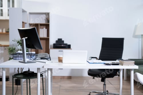 Preview: Workspace Area With Laptop Tablet Smartphone and Paperwork on the Table in the Office Concept.