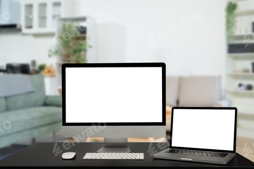 Preview: Workspace with simulated blank white screen computers and office equipment on a wooden table.