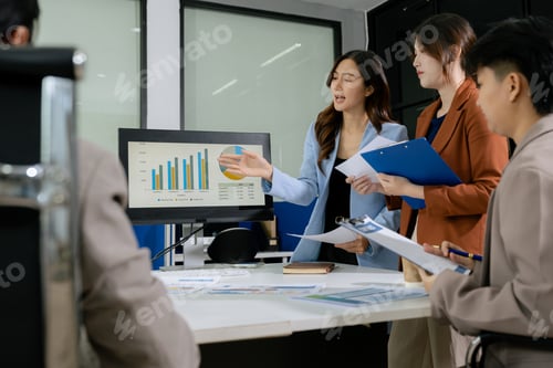 Preview: Business documents on office table with smart phone, tablet and laptop computer and graph with socia