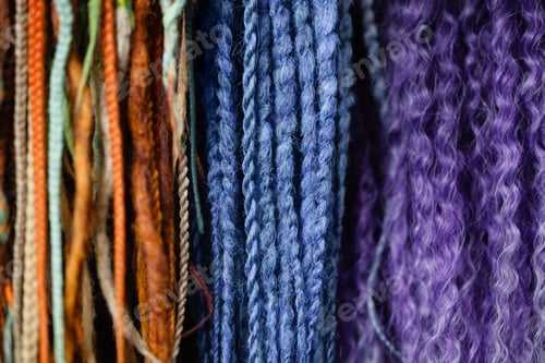 Preview: Colorful braid extensions texture background with blue and purple strands