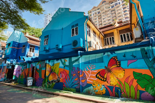 Preview: Kuala Lumplur, Malaysia. A street decorated with vibrant paintings of plants and butterflies